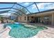 Screened-in pool with a tanning deck, outdoor seating, and a relaxing backyard at 15635 Starling Water, Lithia, FL 33547