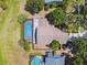 Aerial view of a private pool and a well-maintained home in a peaceful neighborhood at 16503 W Course Dr, Tampa, FL 33624