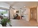 Cozy bedroom features a seating area with a chair, desk, and mirror sliding door closet at 16503 W Course Dr, Tampa, FL 33624