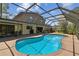 Sparkling screened pool area perfect for swimming and entertaining at 16503 W Course Dr, Tampa, FL 33624