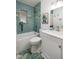 Charming bathroom features a bathtub with stylish tile surround and modern fixtures at 180 58Th Ave, St Pete Beach, FL 33706