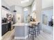 Kitchen with granite countertops, modern stainless steel appliances, and eat-in bar at 18013 Palm Breeze Dr, Tampa, FL 33647
