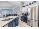 Modern Kitchen area with stainless steel appliances, granite countertops and luxury vinyl plank flooring at 18013 Palm Breeze Dr, Tampa, FL 33647