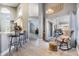 Open living room with luxury vinyl plank flooring, an outside patio, and neutral wall colors at 18013 Palm Breeze Dr, Tampa, FL 33647
