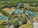 Community clubhouse, pool, tennis courts and playground nestled in a wooded, well maintained area at 19129 Lake Audubon Dr, Tampa, FL 33647