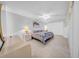 Spacious bedroom with neutral tones, tile flooring, and ample closet space at 20 Windrush Bay Dr # 20, Tarpon Springs, FL 34689