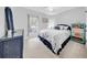 Bedroom featuring a blue wicker dresser and bedframe with light colored walls at 20 Windrush Bay Dr, Tarpon Springs, FL 34689