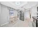 Well-lit kitchen with stainless steel refrigerator, an island and a cozy breakfast nook at 20 Windrush Bay Dr, Tarpon Springs, FL 34689
