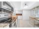 Bright kitchen with stainless steel appliances, backsplash and a spacious countertop at 20 Windrush Bay Dr # 20, Tarpon Springs, FL 34689