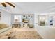 Inviting living room featuring tile flooring, stylish decor and an inviting view to the kitchen at 20 Windrush Bay Dr # 20, Tarpon Springs, FL 34689