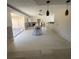 Bright open space featuring a concrete floor, with a large sliding door and natural lighting at 2015 Dolphin S Blvd, St Petersburg, FL 33707