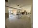Open floor plan showcases large sliding glass doors for optimal natural light at 2015 Dolphin S Blvd, St Petersburg, FL 33707