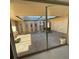 Covered patio with decorative block features and a view of the front yard at 2015 Dolphin S Blvd, St Petersburg, FL 33707