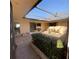 Cozy outdoor patio with a screened-in roof, offering a perfect space for relaxation and entertaining at 2015 Dolphin S Blvd, St Petersburg, FL 33707