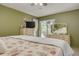 Cozy main bedroom with neutral carpet and access to a patio at 2153 Catalina N Dr, Clearwater, FL 33763