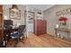 Functional office space with desk, storage cabinets, and a view into the laundry room at 2153 Catalina N Dr, Clearwater, FL 33763