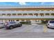 Exterior of a building with multiple residences and a parking lot in front at 2286 Norwegian Dr # 8, Clearwater, FL 33763