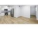 Modern kitchen showcasing stainless steel appliances, granite countertops, and white cabinetry at 2286 Norwegian Dr # 8, Clearwater, FL 33763