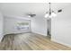 The light filled living room boasts updated flooring and neutral paint tones at 2286 Norwegian Dr # 8, Clearwater, FL 33763