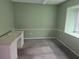 Bedroom with large window, carpet flooring, and room for furniture at 23015 Mayfair Rd, Land O Lakes, FL 34639