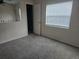Bedroom featuring neutral walls, carpet, a ceiling fan, and a closet at 23015 Mayfair Rd, Land O Lakes, FL 34639