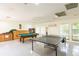Game room features a billiards and ping pong table at 2400 Winding Creek Blvd # 24-102, Clearwater, FL 33761