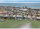 Stunning aerial of coastal real estate, blending tranquil waterfront living with nearby city amenities at 2511 Bay Blvd # B, Indian Rocks Beach, FL 33785