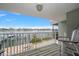 Enjoy serene waterfront views from this condo's spacious balcony with room for outdoor seating at 2511 Bay Blvd # B, Indian Rocks Beach, FL 33785