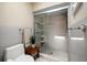 Bathroom featuring tiled shower and neutral color palette, creating a clean and relaxing space at 2511 Bay Blvd # B, Indian Rocks Beach, FL 33785