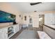 Bright bedroom with TV, wood floor and neutral decor, offers a cozy and relaxing space at 2511 Bay Blvd # B, Indian Rocks Beach, FL 33785