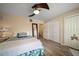 Comfortable bedroom with laminate flooring and closet space and plenty of natural light at 2511 Bay Blvd # B, Indian Rocks Beach, FL 33785