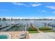 Waterfront views of the canal with a boat dock and sunny lounge area at 2511 Bay Blvd # B, Indian Rocks Beach, FL 33785