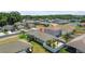 Aerial view showing the house, its backyard with a fence, and neighboring houses at 25830 Crippen Dr, Land O Lakes, FL 34639