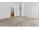 Spacious carpeted bedroom features two closets and ensuite bath access at 25830 Crippen Dr, Land O Lakes, FL 34639