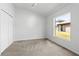 Bedroom with carpet, closet and natural light from the window at 25830 Crippen Dr, Land O Lakes, FL 34639