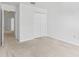 Carpeted bedroom with double door closet provides ample space at 25830 Crippen Dr, Land O Lakes, FL 34639