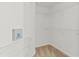 Walk-in closet featuring white walls and wire shelving for optimal storage solutions at 25830 Crippen Dr, Land O Lakes, FL 34639