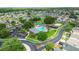 Aerial view of community center with pool, playground, and recreational areas at 25830 Crippen Dr, Land O Lakes, FL 34639