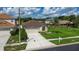 Charming single-Gathering home features a well-manicured lawn and a two-car garage at 25830 Crippen Dr, Land O Lakes, FL 34639
