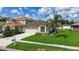 Well maintained single-story home with fresh landscaping and an attached two-car garage at 25830 Crippen Dr, Land O Lakes, FL 34639