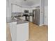 Bright kitchen features granite countertops, stainless steel appliances, and tile flooring at 25830 Crippen Dr, Land O Lakes, FL 34639