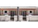 Charming exterior showcases a unique patio and pergola with privacy fence to add to the private feel of the yard at 20 Outlook Way Blvd # 7, Dunedin, FL 34698