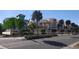 Street view of new beach homes with balconies, awnings, mature landscaping, and a sidewalk at 20 Outlook Way Blvd # 7, Dunedin, FL 34698