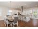 Kitchen and dining area with stainless steel appliances and granite counters at 20 Outlook Way Blvd # 7, Dunedin, FL 34698