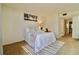 Bright bedroom features carpet and neutral decor, with minimalist modern furnishings at 2700 Cove Cay Dr # 2B, Clearwater, FL 33760
