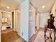 Inviting condo entryway featuring tiled floors and access to the bathroom at 2700 Cove Cay Dr # 2B, Clearwater, FL 33760