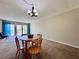 The cozy living area offers natural light and a comfortable dining space at 2700 Cove Cay Dr # 2B, Clearwater, FL 33760