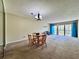 The cozy living area offers natural light and dining area at 2700 Cove Cay Dr # 2B, Clearwater, FL 33760