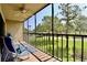 The screened patio offers golf course views and plenty of space for relaxing at 2700 Cove Cay Dr # 2B, Clearwater, FL 33760