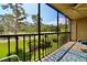 The screened patio offers golf course views at 2700 Cove Cay Dr # 2B, Clearwater, FL 33760